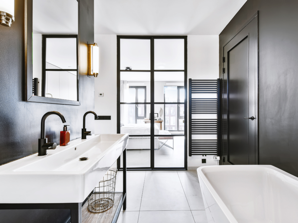 Image bathroom in white, brown and black colours.