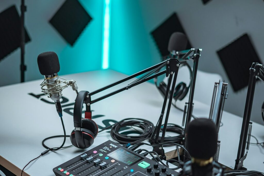 Radio studio broadcast desk with audio mixer and microphone