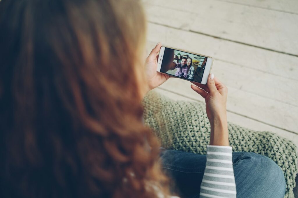 Woman watching a video on her smartphone