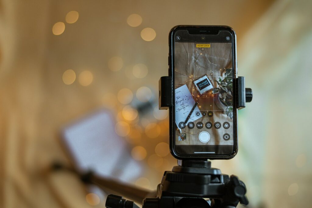 Camera on a tripod set up for filming social media content