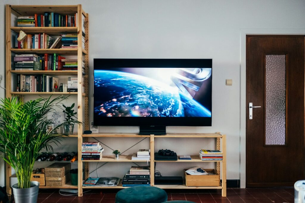 Flat screen TV switched on in a modern living room